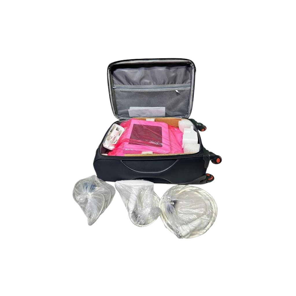 2015 Venus Viva attachments view showing an open rolling suitcase with a pink protective pad and small accessories, alongside three individually bagged coiled cable covers