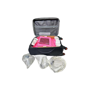 2015 Venus Viva attachments view showing an open rolling suitcase with a pink protective pad and small accessories, alongside three individually bagged coiled cable covers