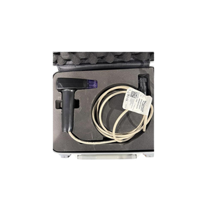 Black InMode Optimas applicator handpiece with coiled cable and accessories in foam-lined hard case, pre-owned 2020
