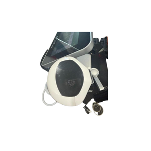 Top view of InMode Optimas Pre-Owned (2020) showing touchscreen and white applicator handpiece in holder