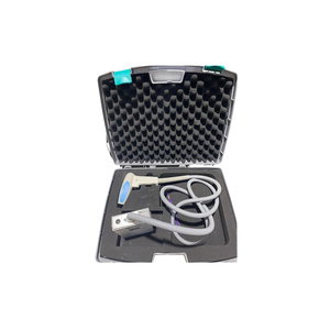 2020 Alma Accent Prime attachments view 1 showing an open black carrying case with a handpiece and coiled cable