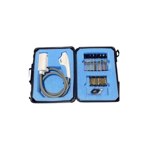 2020 Sciton mJoule with Moxi_BBL_HERO attachments view showing a handpiece, coiled cable, and filter cartridges in an open blue carrying case