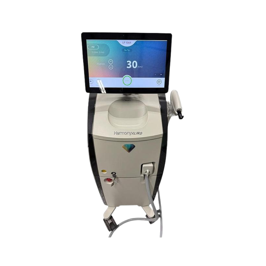 2022 Alma Harmony XL Pro front view showing the upright body with touchscreen display and handpiece attached at the side