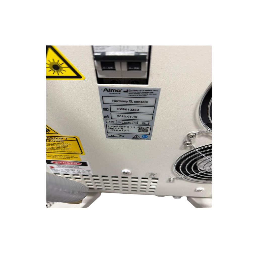 2022 Alma Harmony XL Pro serial number view showing the rear panel with warning labels and manufacturer information plate