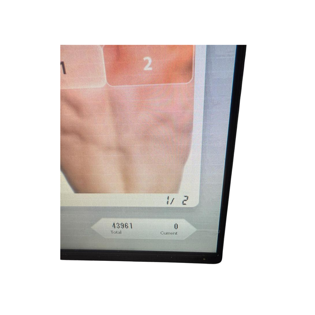 2022 Alma Soprano Console ICE Platinum close up view showing the display screen with a magnified image of skin during treatment