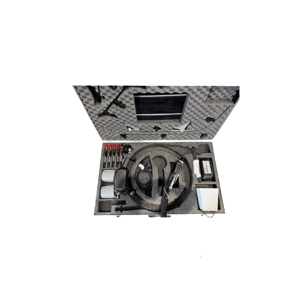 2022 DEKA Motus AZ attachments view showing a hard carrying case with handpieces, cables, and connector accessories