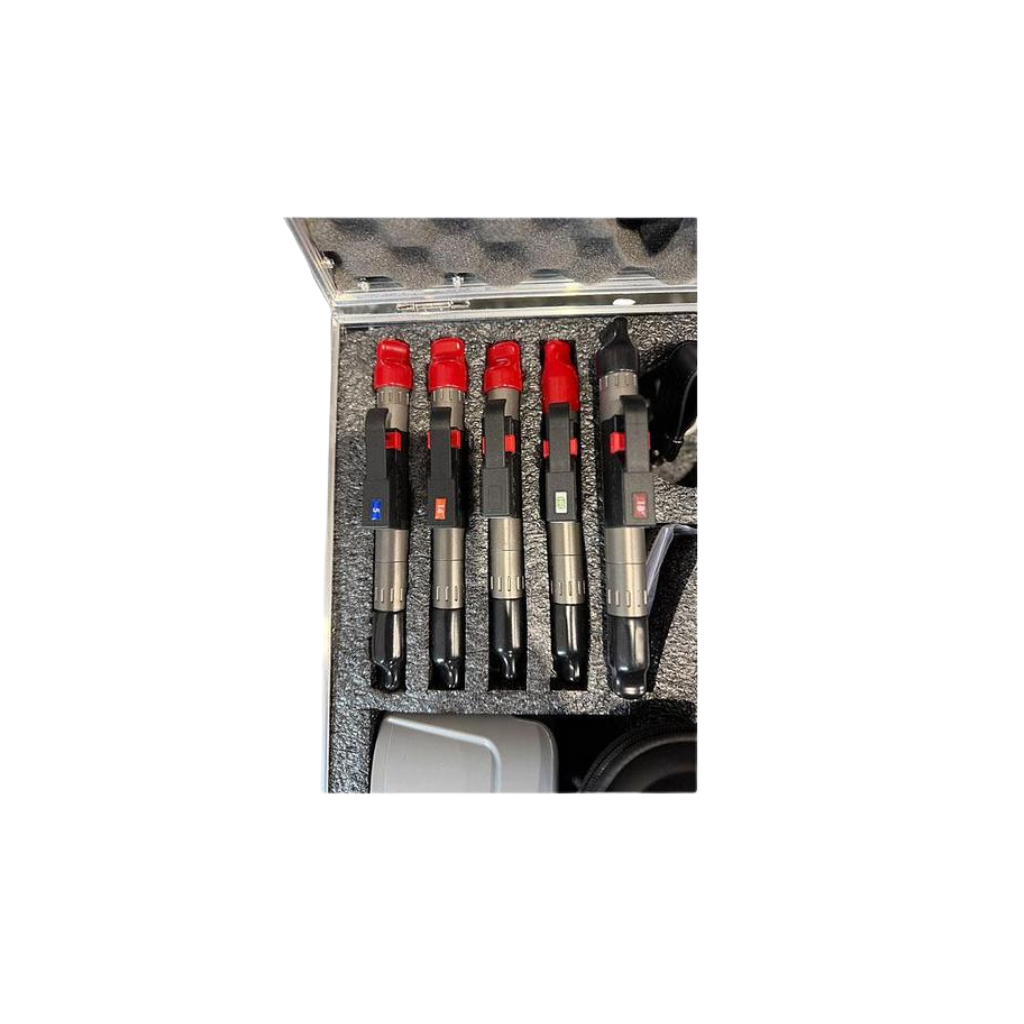 2022 DEKA Motus AZ attachments view 2 showing a set of handpieces with red safety keys stored in a foam-lined case