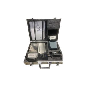 2022 DEKA SmartXide Tetra attachments view showing a metal carrying case with accessory components