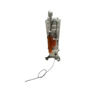2022 DEKA SmartXide Tetra back view showing the upright body with articulated arm and orange protective cover