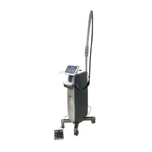 2022 Lutronic LaseMD Ultra left side view showing the upright body with display screen, articulated arm, and rolling base