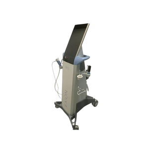 2023 BTL EXION left side view showing the upright body with display screen, handpiece cables, and rolling base