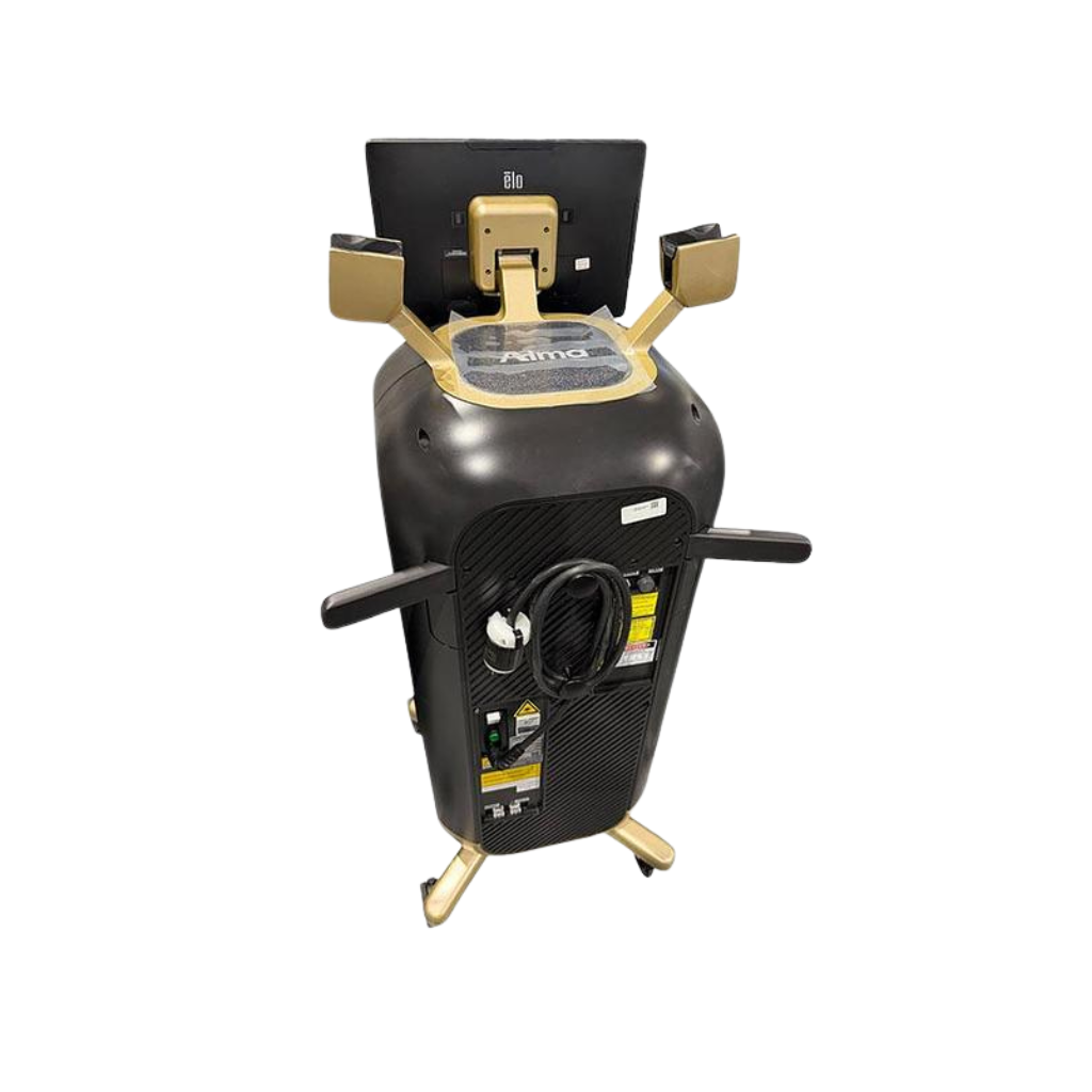 2024 Alma Harmony back view showing the tall cylindrical body, side handles, tripod base, and rear control panel