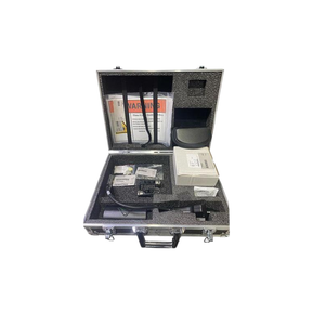 2024 DEKA SmartXide Tetra PRO attachments view showing an open metal carrying case with handpieces and accessory components