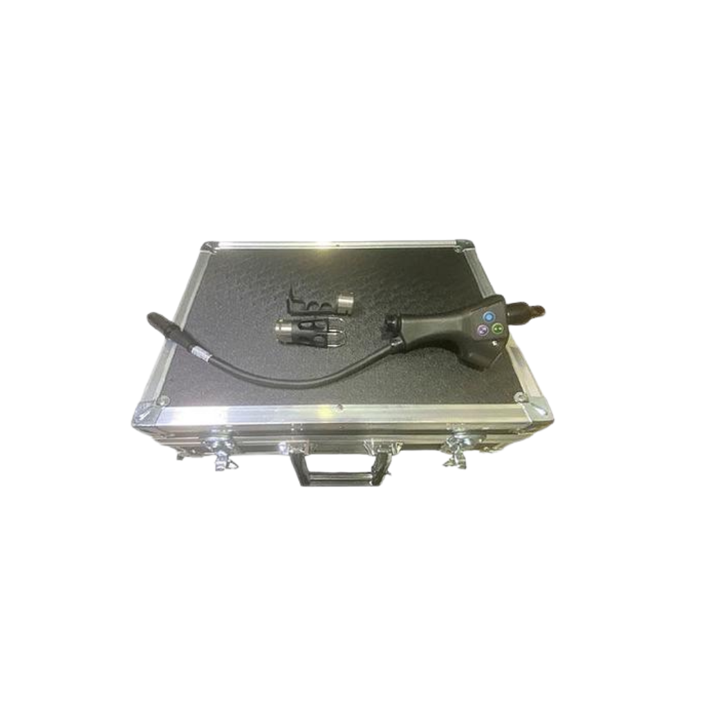 2024 DEKA SmartXide Tetra PRO controller view showing the handpiece and articulated arm packaged in a metal carrying case