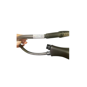 2024 DEKA SmartXide Tetra PRO serial number view showing a hand holding the handpiece with coiled cable attached