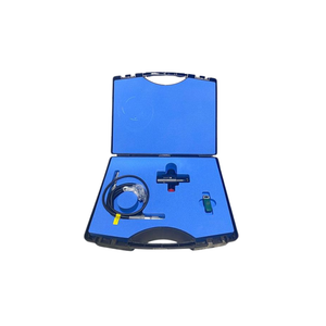 2024 Lumenis AcuPulse Co2 Laser attachments view 2 showing a blue carrying case with a handpiece, cable, and connector accessories