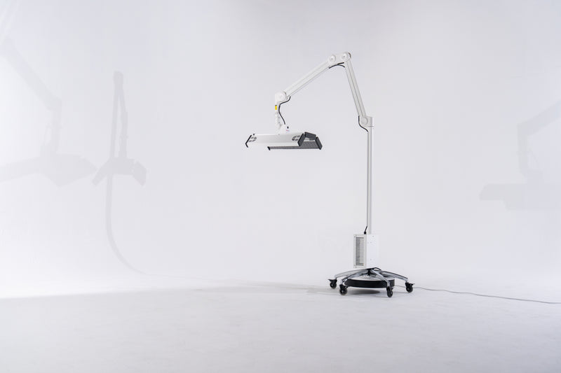 Medical examination lamp on a white background