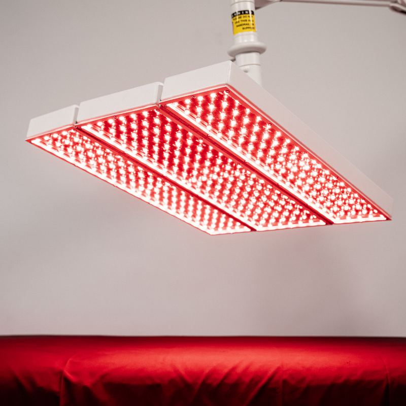 Body Balance System Apollo ARC red light therapy system showing a close up view of the LED lights switched on.