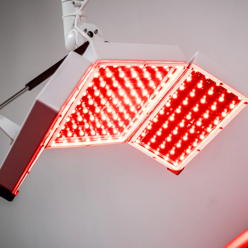 Body Balance System Apollo GLOW red light therapy system showing a close up view of the LED lights switched on