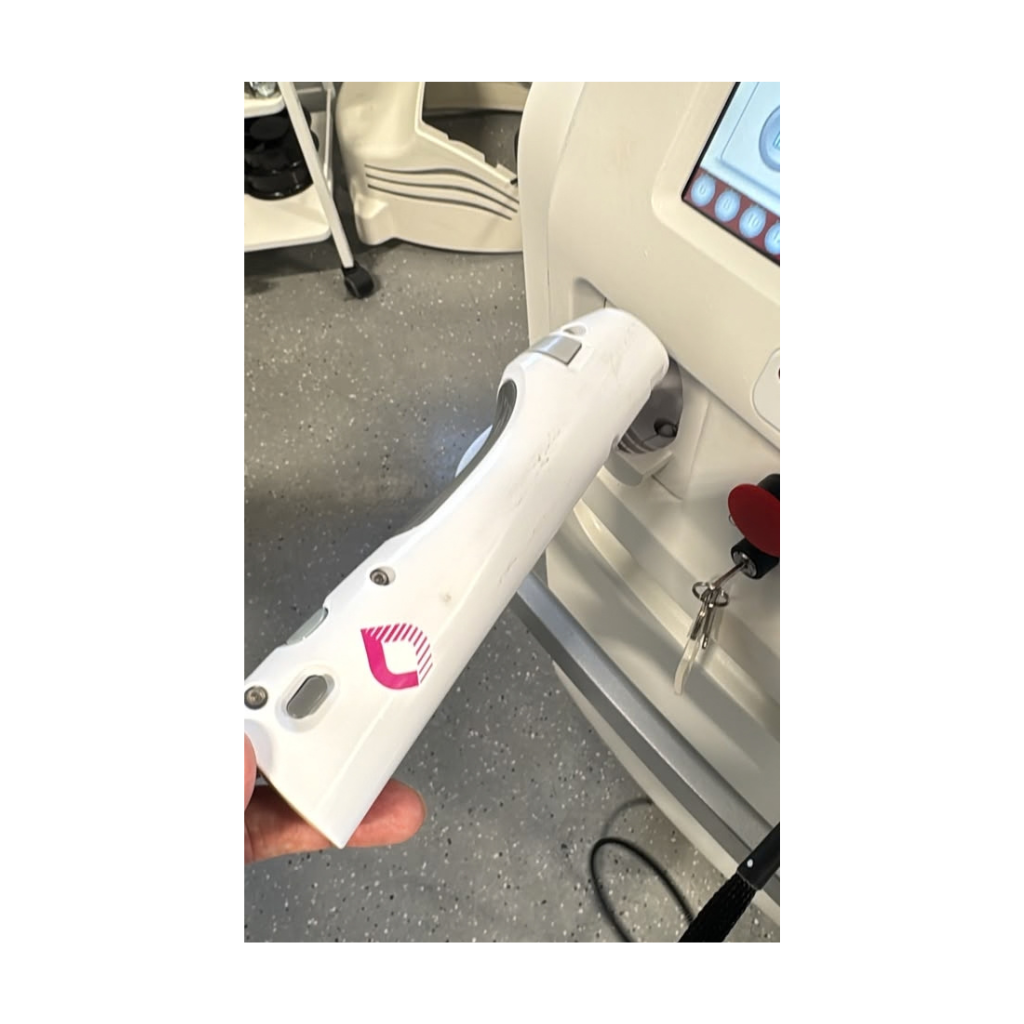 Close-up of the Candela GentleMax Pro Plus 2022 GLX handpiece with pink alignment guide