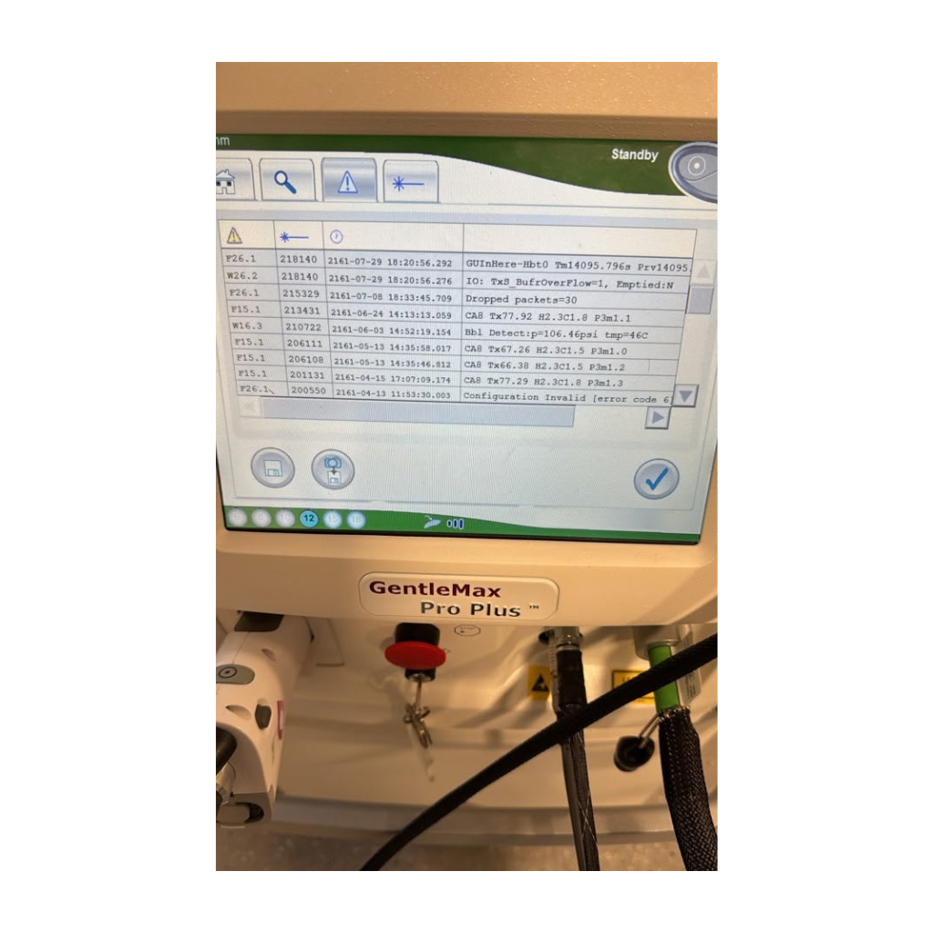 Candela GentleMax Pro Plus touchscreen displaying system warning and safety alert messages