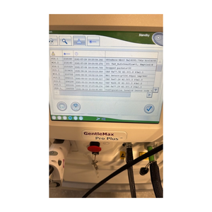 Candela GentleMax Pro Plus touchscreen displaying system warning and safety alert messages