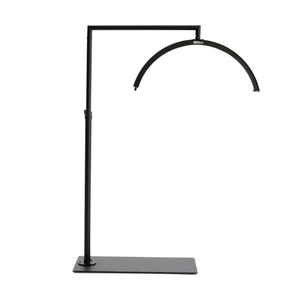 CosmoGlo LED original light black with adjustable arm and phone clip, professional illumination tool for med spa injectors and dermatology treatment procedures.