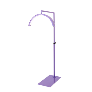 CosmoGlo LED XL light lavender with adjustable arm and phone clip, professional illumination tool for med spa injectors and dermatology treatment procedures.