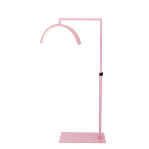 CosmoGlo LED XL light pink with adjustable arm and phone clip, professional illumination tool for med spa injectors and dermatology treatment procedures.