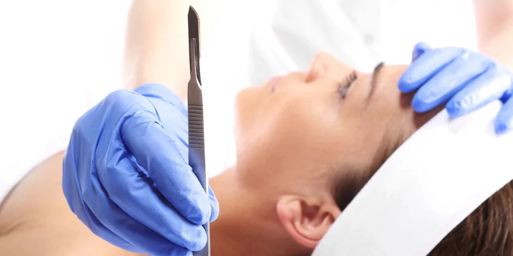 Dermaplaning treatment being performed on a woman lying down, a popular exfoliation technique for smooth and radiant skin