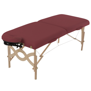 Earthlite Avalon XD Massage Flat Table with Burgundy upholstery for wellness practices.