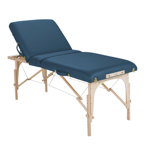 Earthlite Avalon XD Massage Tilt Table with Mystic Blue upholstery adjustable tilt design for wellness practices.