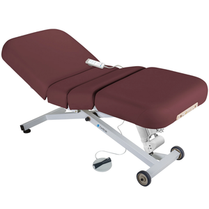Earthlite Ellora Electric Salon Massage Table Burgundy with cushioned flat top and electric lift base, designed for adjustable height and professional Med Spa and wellness practices.