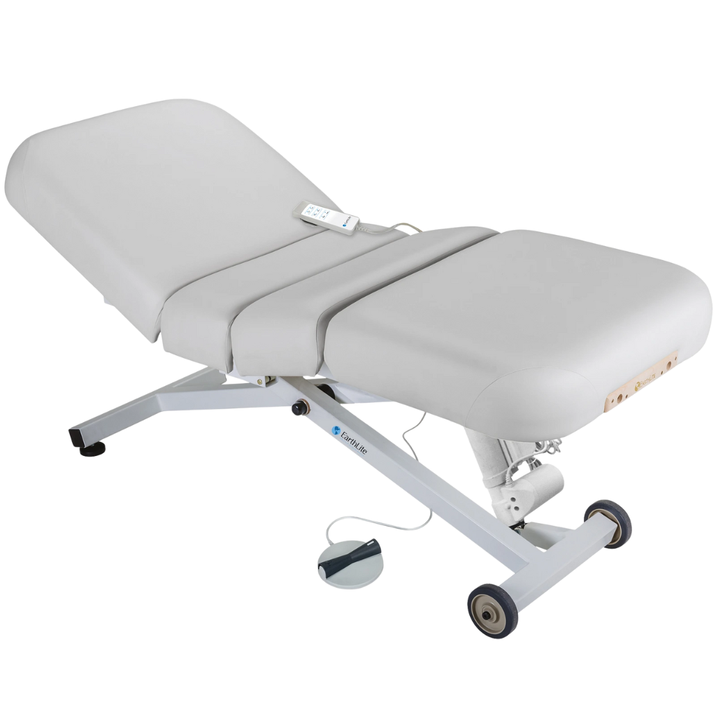 Earthlite Ellora Electric Salon Massage Table Sterling with cushioned flat top and electric lift base, designed for adjustable height and professional Med Spa and wellness practices.