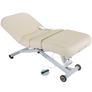 Earthlite Ellora Electric Salon Massage Table Vanilla Creme with cushioned flat top and electric lift base, designed for adjustable height and professional Med Spa and wellness practices.