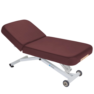 Earthlite Ellora Manual Tilt Electric Lift Table Burgundy with cushioned top and adjustable base, showing manual tilt control and electric height lift, designed for professional Med Spa and wellness practices.