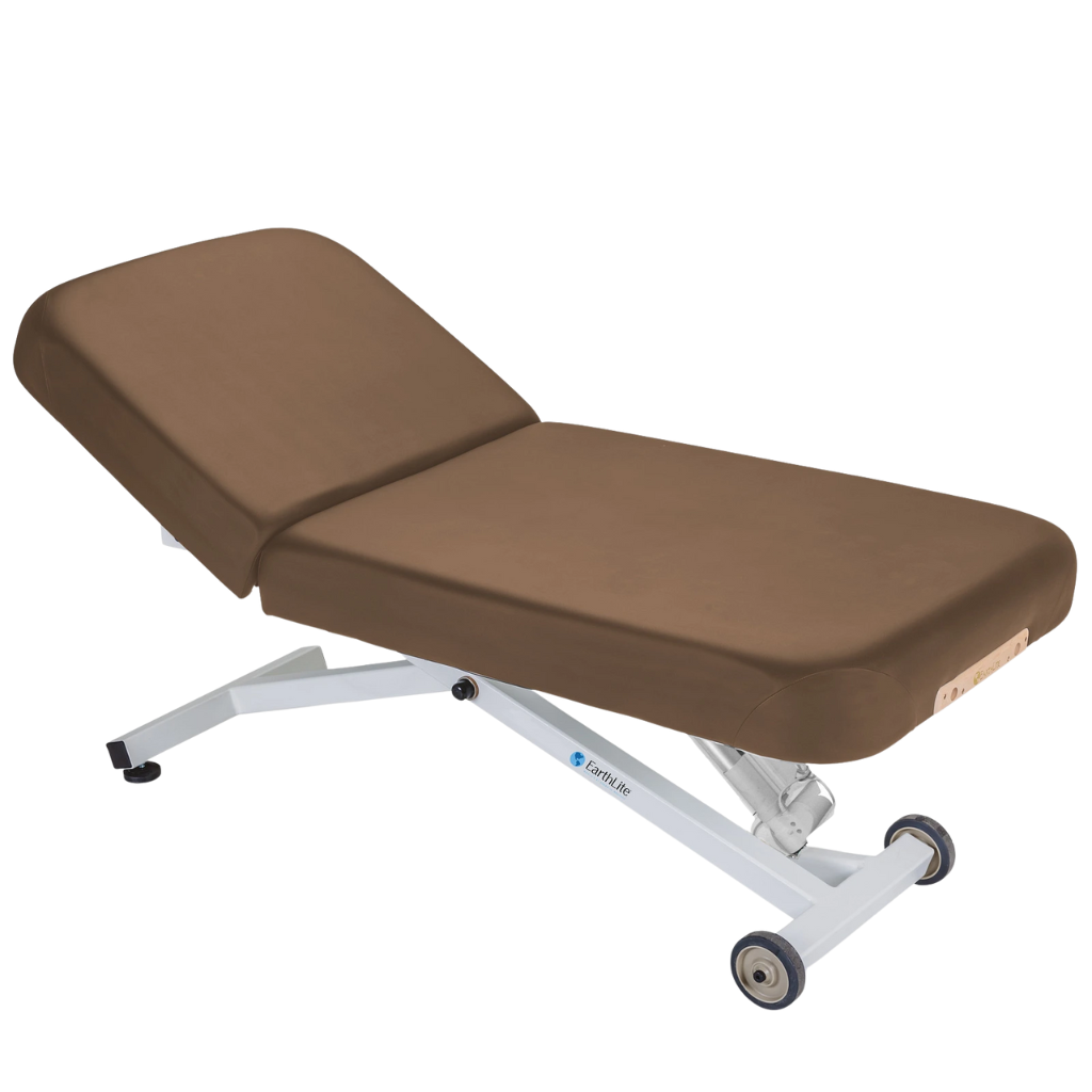 Earthlite Ellora Manual Tilt Electric Lift Table Latte with cushioned top and adjustable base, showing manual tilt control and electric height lift, designed for professional Med Spa and wellness practices.