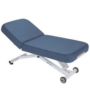 Earthlite Ellora Manual Tilt Electric Lift Table Mystic Blue with cushioned top and adjustable base, showing manual tilt control and electric height lift, designed for professional Med Spa and wellness practices.