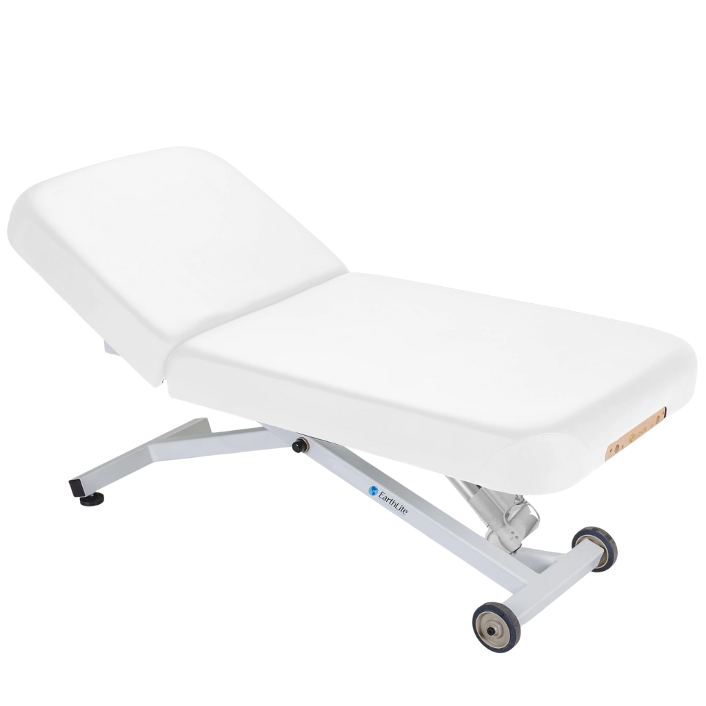 Earthlite Ellora Manual Tilt Electric Lift Table Pure White with cushioned top and adjustable base, showing manual tilt control and electric height lift, designed for professional Med Spa and wellness practices.