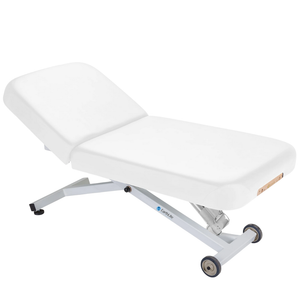 Earthlite Ellora Manual Tilt Electric Lift Table Pure White with cushioned top and adjustable base, showing manual tilt control and electric height lift, designed for professional Med Spa and wellness practices.