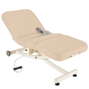 Earthlite Ellora Vista Electric Salon Massage Table Marie's Beige with cushioned flat top and electric lift base, designed for adjustable height and comfort in professional Med Spa and wellness practices.