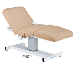Earthlite Everest Electric Salon Pedestal Electric Lift Table Marie's Beige with cushioned flat top and single-column base, featuring adjustable electric functions for professional Med Spa and wellness practices.