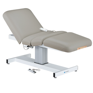 Earthlite Everest Electric Salon Pedestal Electric Lift Table Sterling with cushioned flat top and single-column base, featuring adjustable electric functions for professional Med Spa and wellness practices.