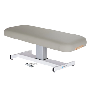 Earthlite Everest Flat Pedestal Electric Lift Table Sterling with wide cushioned top, pneumatic tilt control, and stable base, designed for professional Med Spa and wellness practices.