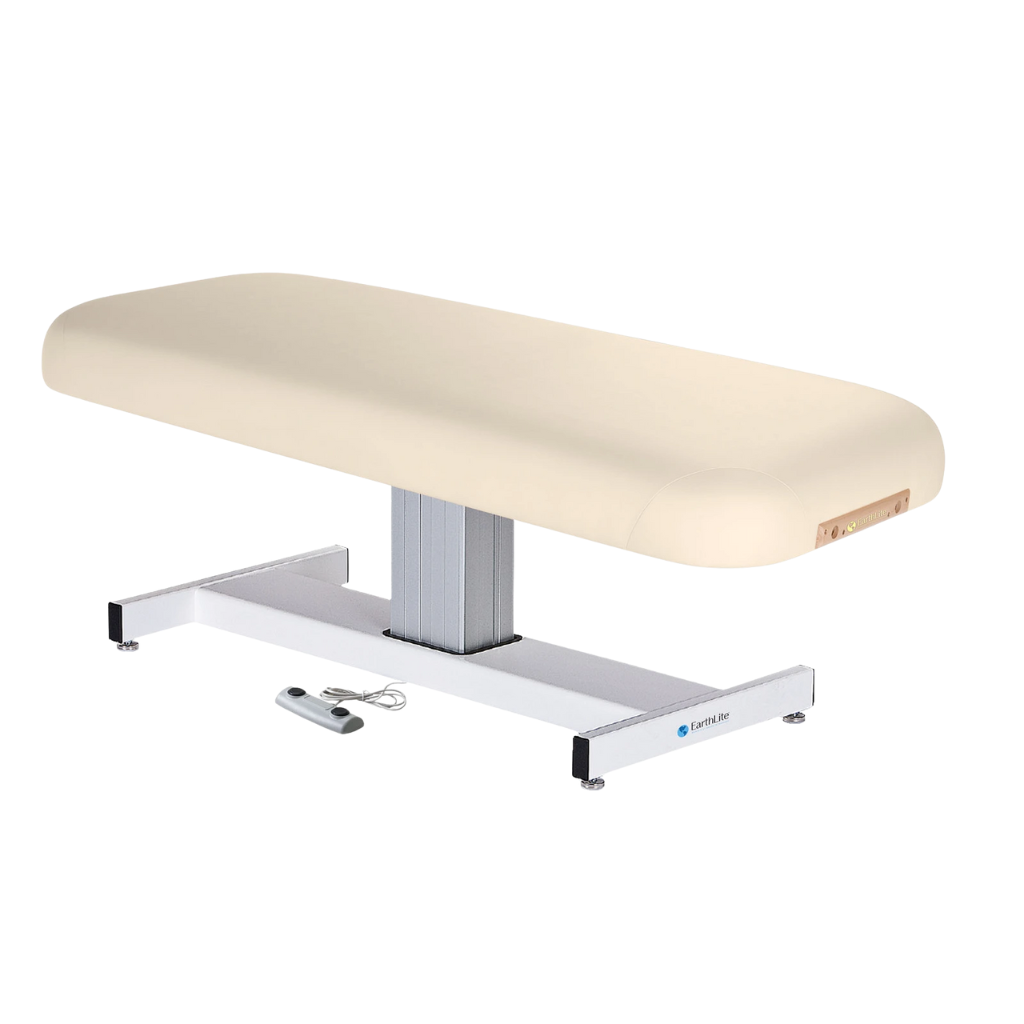 Earthlite Everest Flat Pedestal Electric Lift Table Vanilla Creme with wide cushioned top, pneumatic tilt control, and stable base, designed for professional Med Spa and wellness practices.