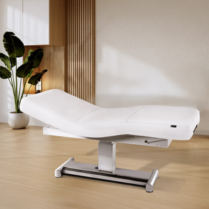 Earthlite Everest LX Salon Top Electric Lift Table with white replaceable mattress and sturdy metal base, designed for Med Spa and IV hydration practices in setting.