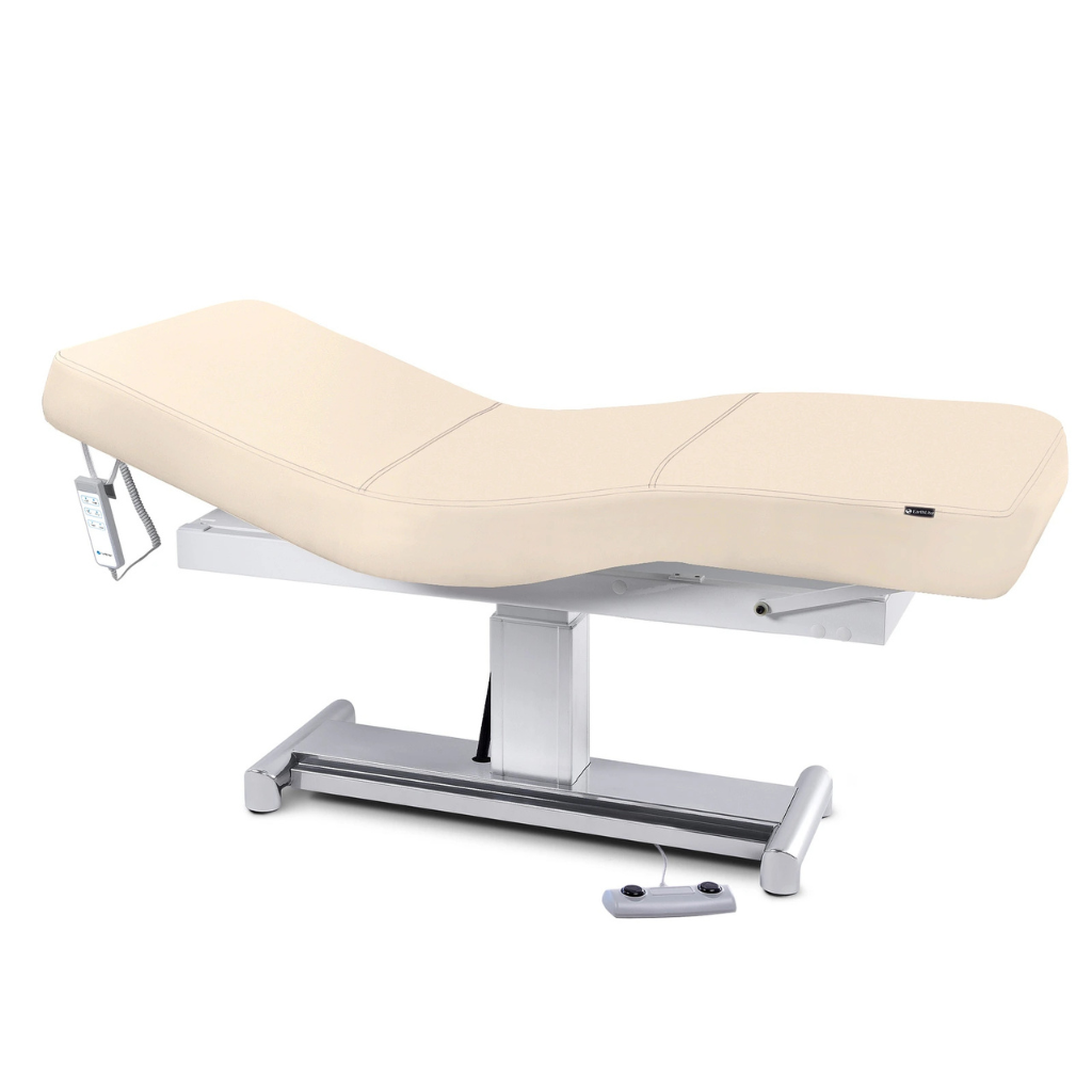 Earthlite Everest LX Salon Top Electric Lift Table with Marie's Beige replaceable mattress and sturdy metal base, designed for Med Spa and IV hydration practices.