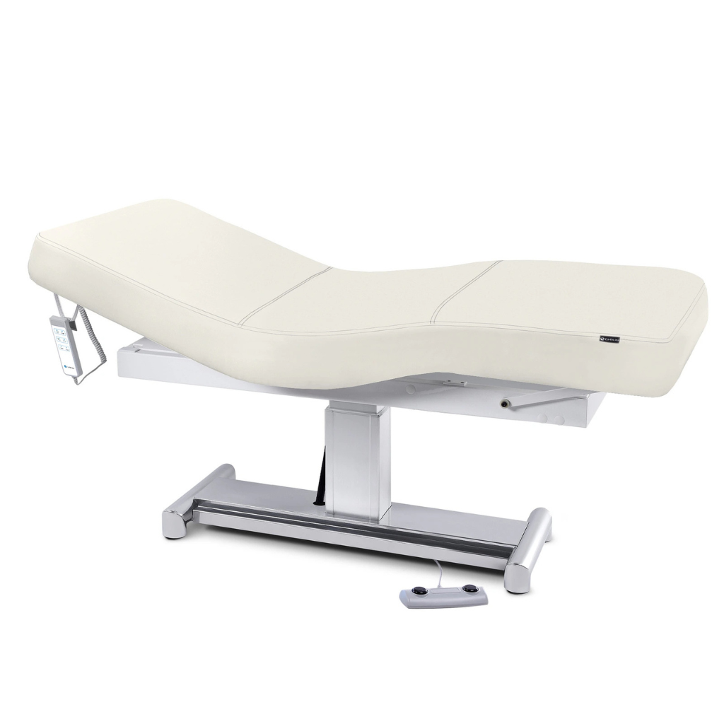 Earthlite Everest LX Salon Top Electric Lift Table with Vanilla Creme replaceable mattress and sturdy metal base, designed for Med Spa and IV hydration practices.