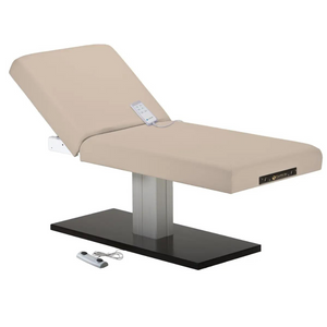 Earthlite Everest Spa Pedestal Electric Tilt Table Marie's Beige with cushioned top and single-column electric base, showing adjustable tilt feature for professional Med Spa and wellness treatments.