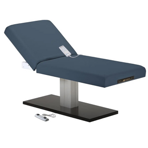 Earthlite Everest Spa Pedestal Electric Tilt Table Mystic Blue with cushioned top and single-column electric base, showing adjustable tilt feature for professional Med Spa and wellness treatments.